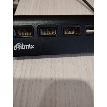 Разветвитель USB RITMIX CR-2400 черный (USB хаб) настольный, кабель 1м, на 4 порта USB, High speed USB 2.0, Plug-n-Play, питание от USB, 5В, скорость до 480 Мбит/с, поддержка Winows 2000, XP, Vista, 7, 8, Me, Mac OS 9.1 и выше, Linux 2.4.2, алюминиевый ко
